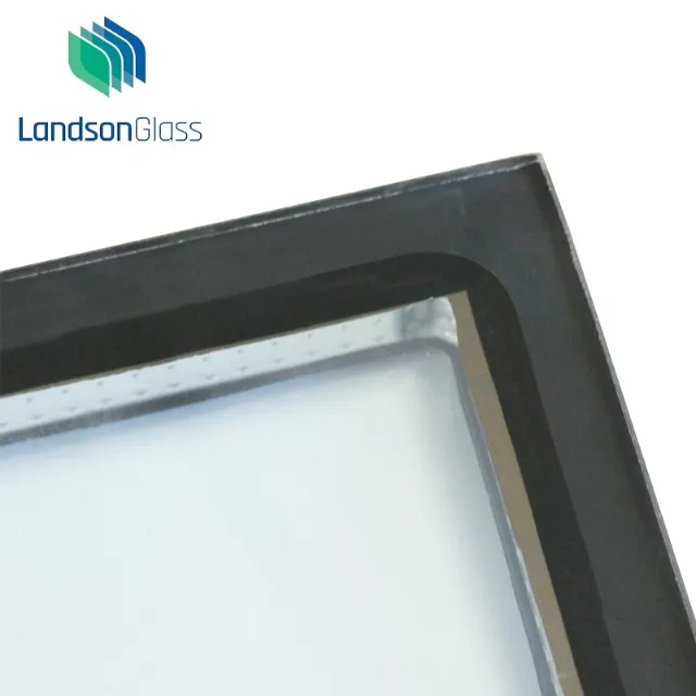 Close-up view of a double-glazed insulated glass unit showing the spacer and sealed edge